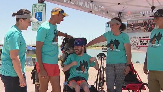 2 men work to finish Ironman Triathlon together