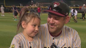 Dads play catch at Chase Field for Father's Day