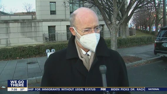 Governor Tom Wolf talks to members of the National Guard