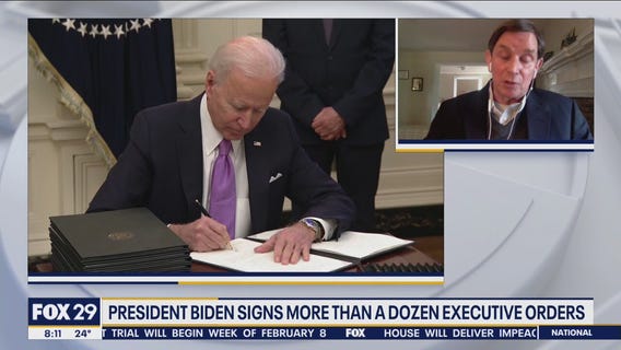 President Biden signs more than a dozen executive orders