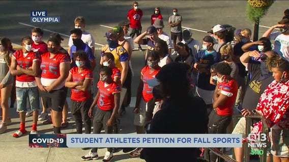 Student-athletes march to Washington state capitol for fall sports