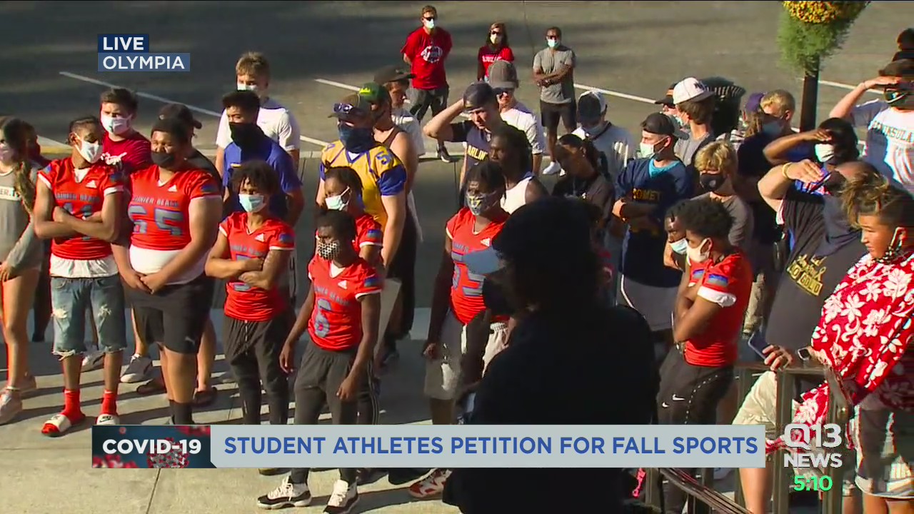 Student-athletes march to Washington state capitol for fall sports