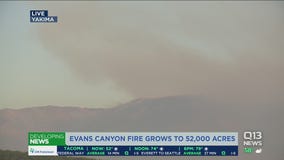 Evans Canyon Fire balloons again overnight