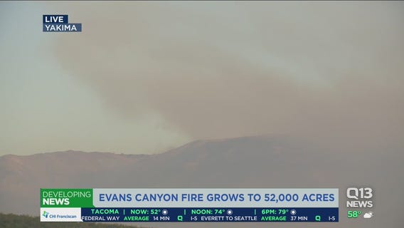 Evans Canyon Fire balloons again overnight
