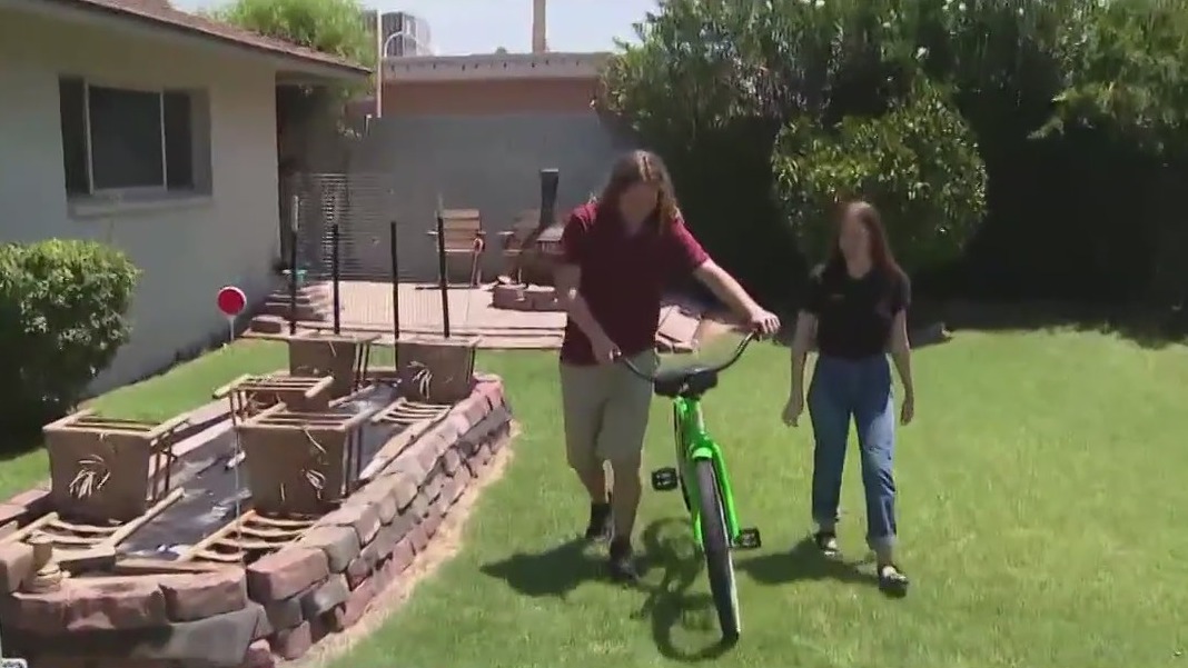 Middle school fixes up bike, gifts it to teacher