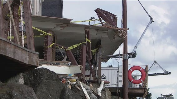 Barge pushed by tugboat hits three homes in Gig Harbor, Washington