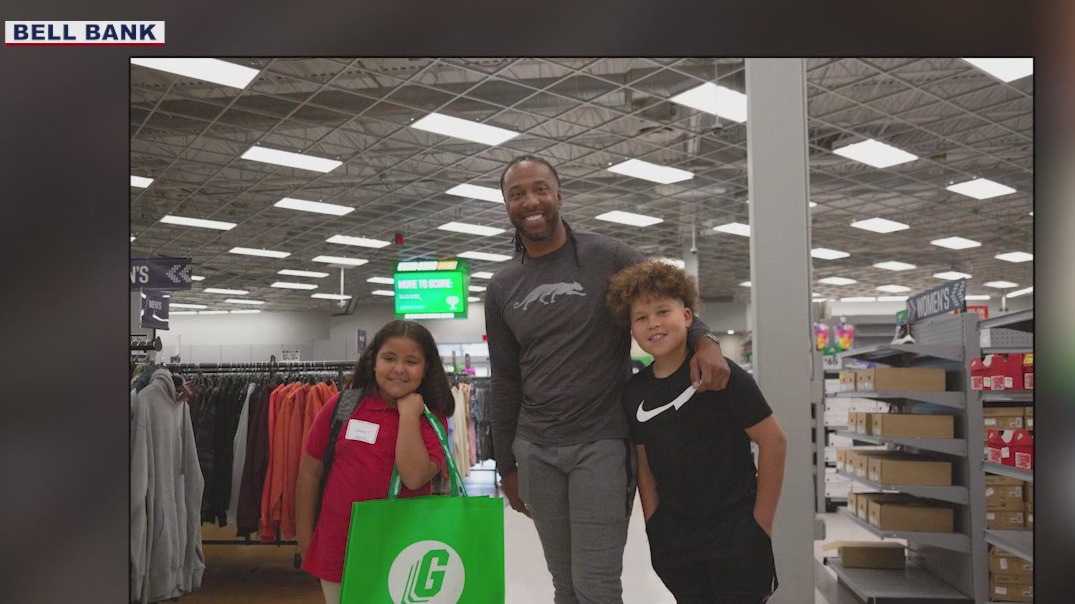 Larry Fitzgerald takes kids on shopping spree