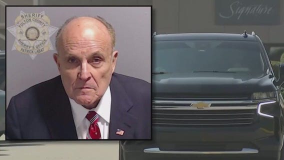 Rudy Giuliani turns himself in, receives mug shot