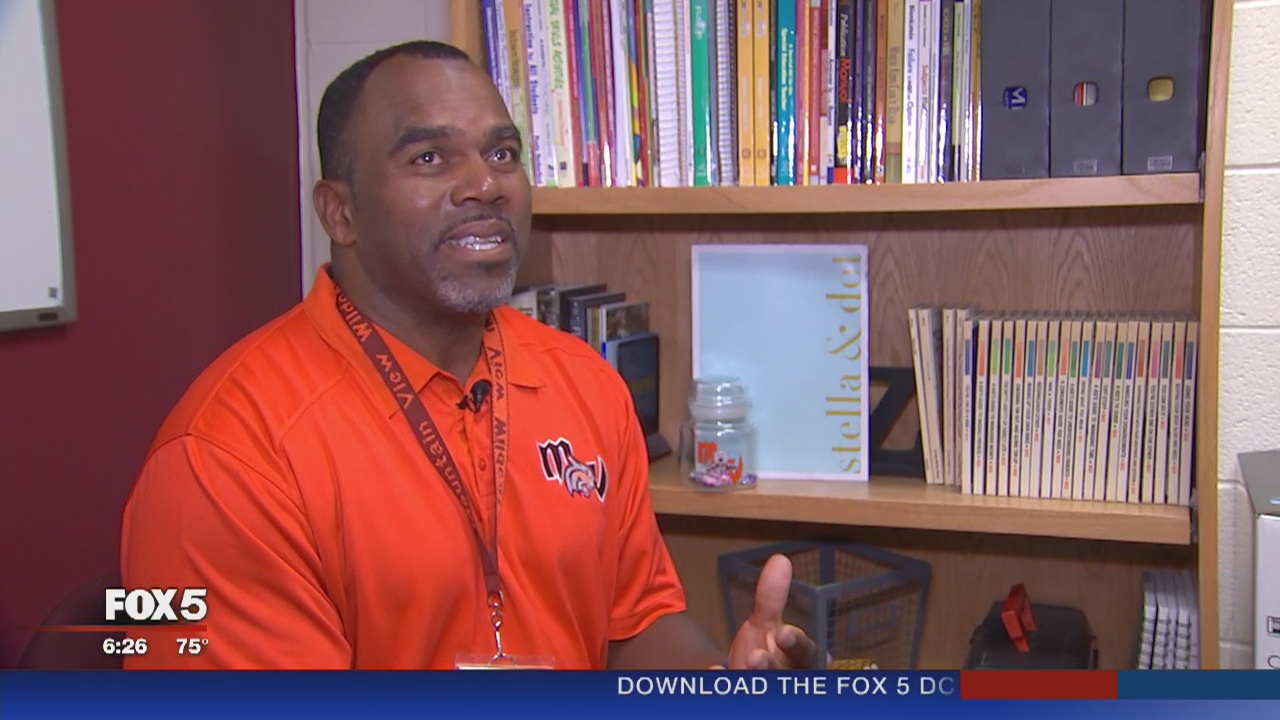 Former NFL player George Coghill leading young minds in the classroom