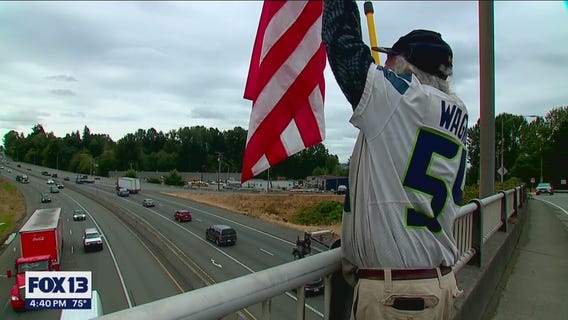 'Don't ever give up on you:' Vietnam veteran stands on overpass with message of suicide prevention