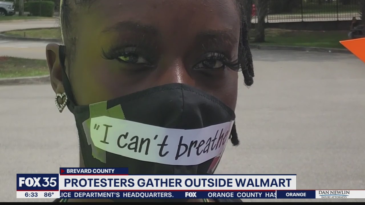 Protesters gather outside Walmart