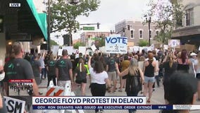 Protesters, police officers jion in DeLand demonstrations