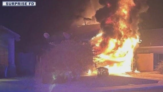 Hybrid car catches fire in Surprise home's garage