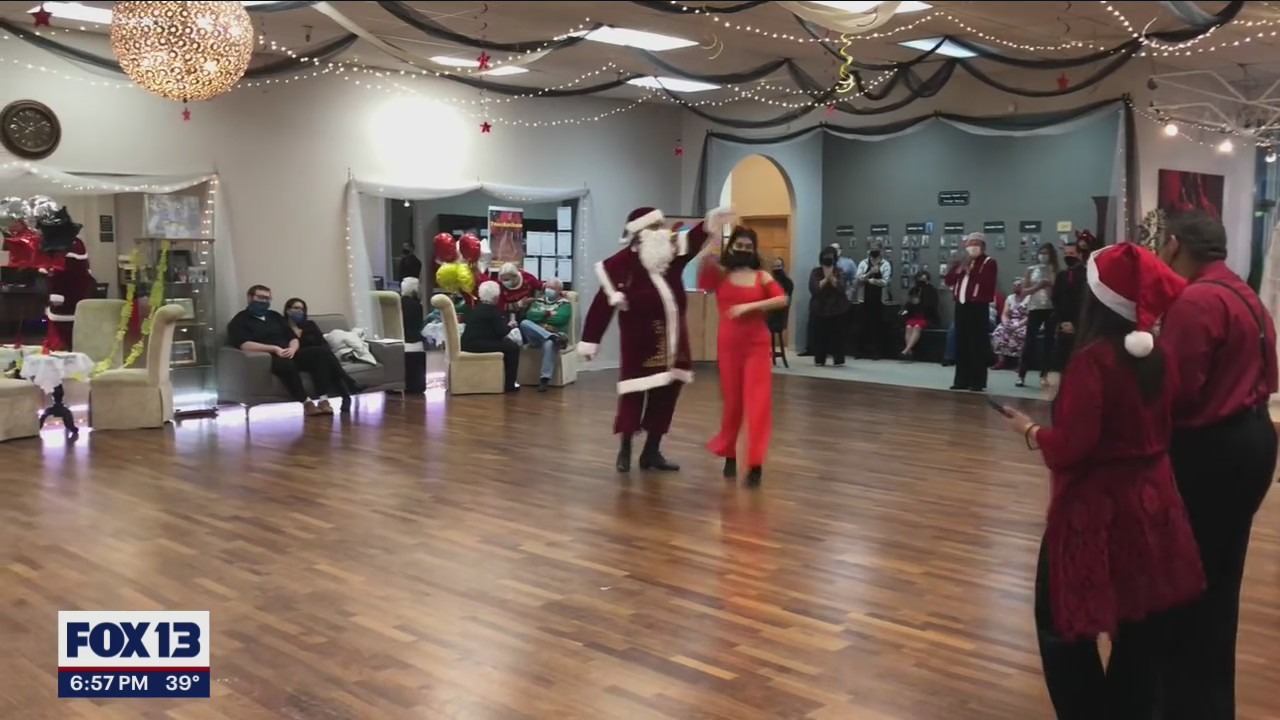 Santa shows off how to do the Merengue
