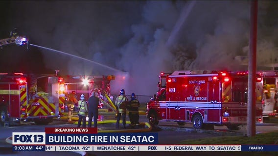 Crews tackle building fire in SeaTac