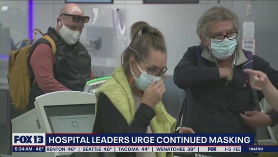 Hospital leaders urge continued masking