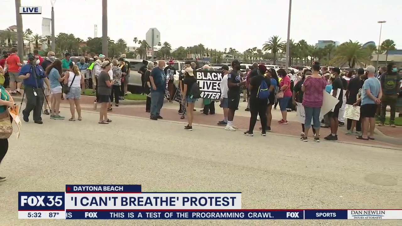 Police join demonstrators for protest march in Daytona Beach