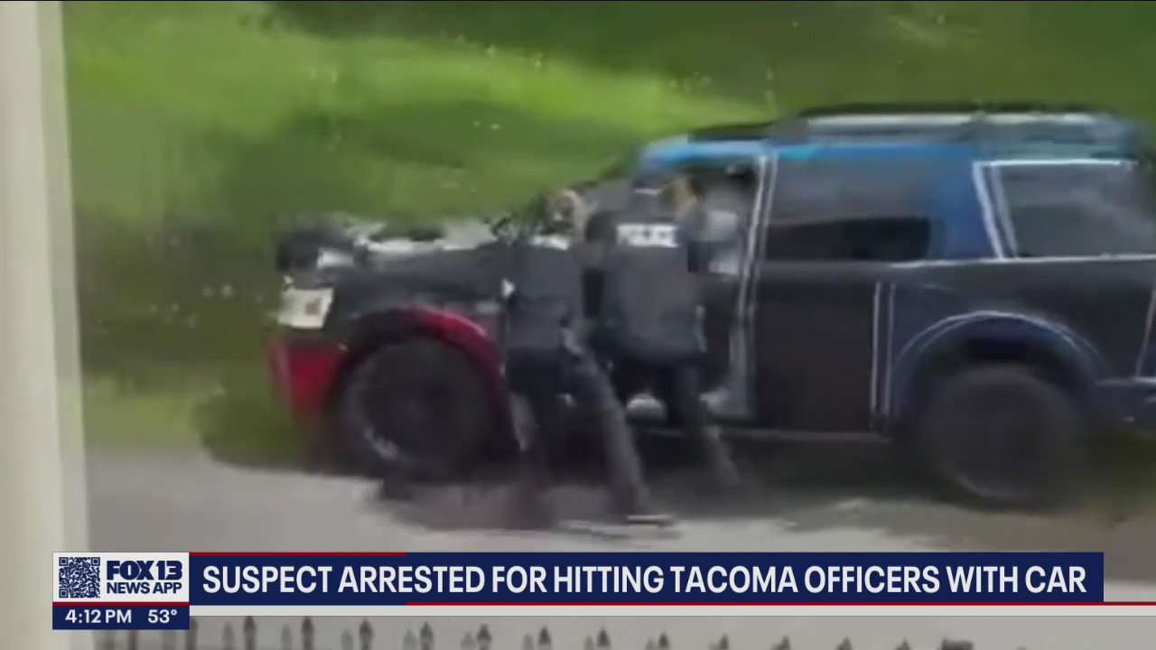 Tacoma police arrest man suspected of hitting 2 officers with stolen car