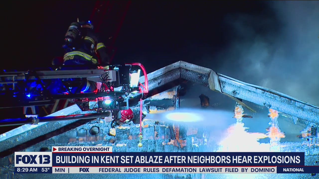 Building in Kent set ablaze after neighbors hear explosions