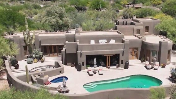 Artist-built home surrounded by boulders l Cool House