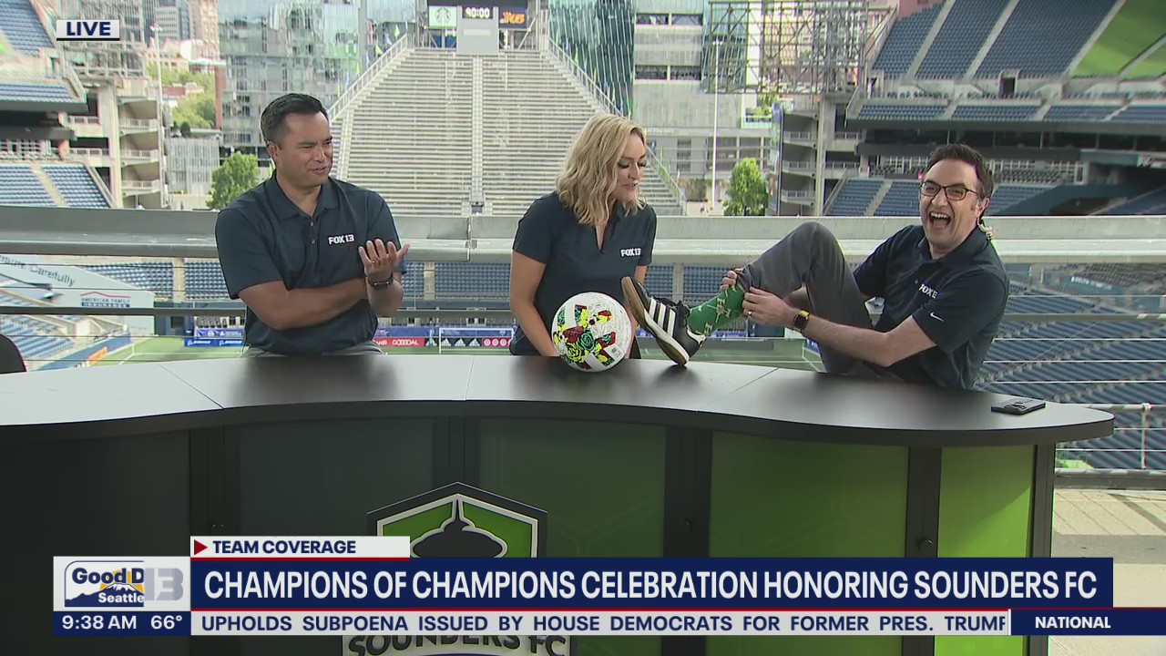 Brian MacMillan showing off his Portland Timbers socks in Sounders territory