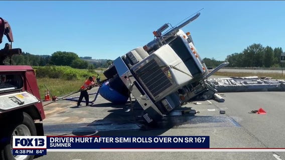 Driver hurt after semi truck rolls over on SR 167