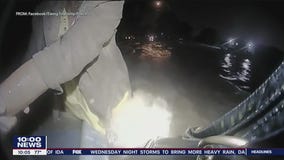 Ewing police officer helps rescue woman from floodwaters