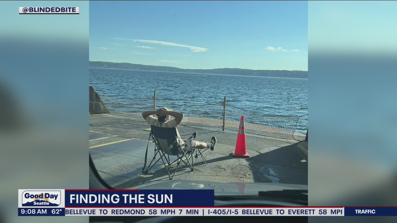 Seattle man enjoys the sun on the ferry to Bremerton