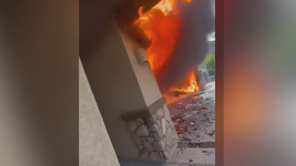 Real estate agent rescues dog from burning home