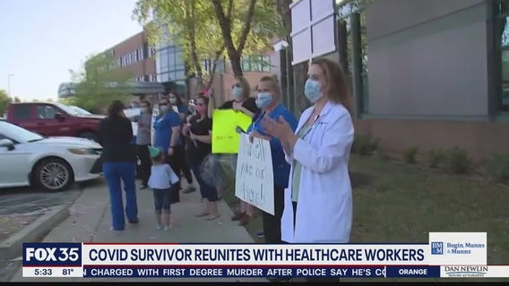 COVID-19 survivor reunites with healthcare workers