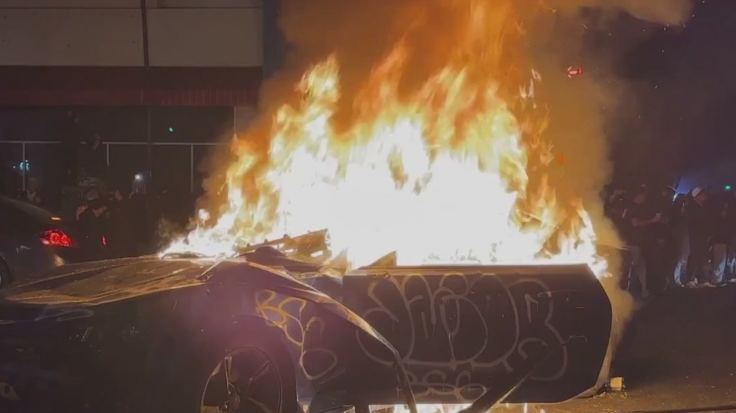Cars torched, businesses defaced as Oakland sideshows critically injure one