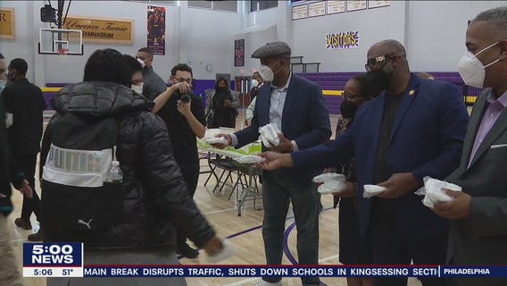 Camden officials distribute KN95 masks, as rollout of free masks nationwide begins