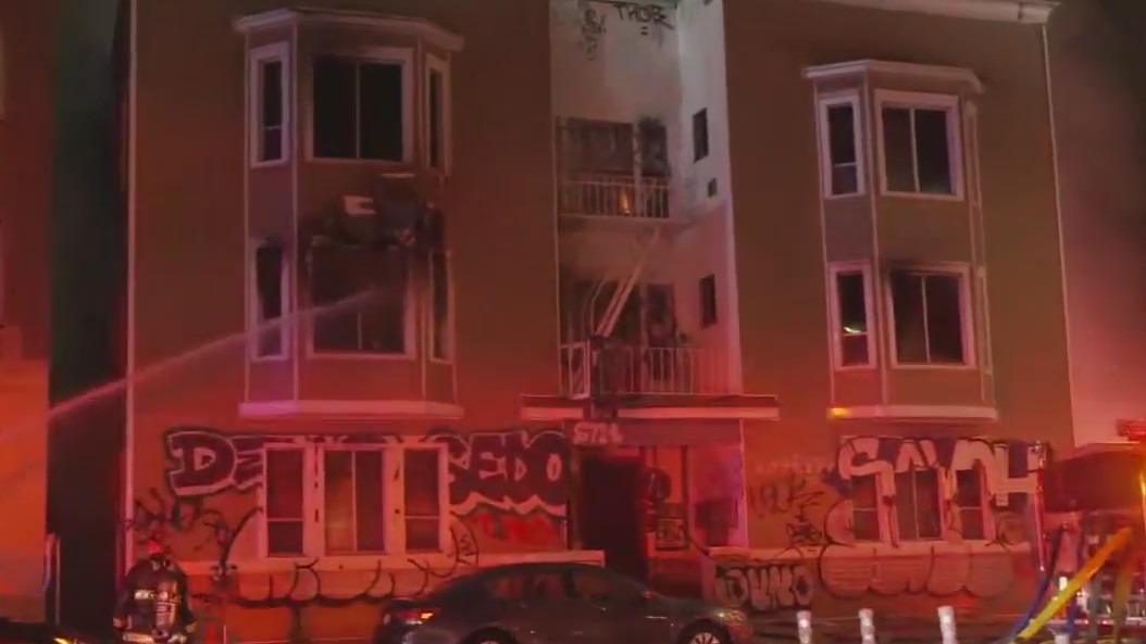 Empty apartment building on fire in Oakland