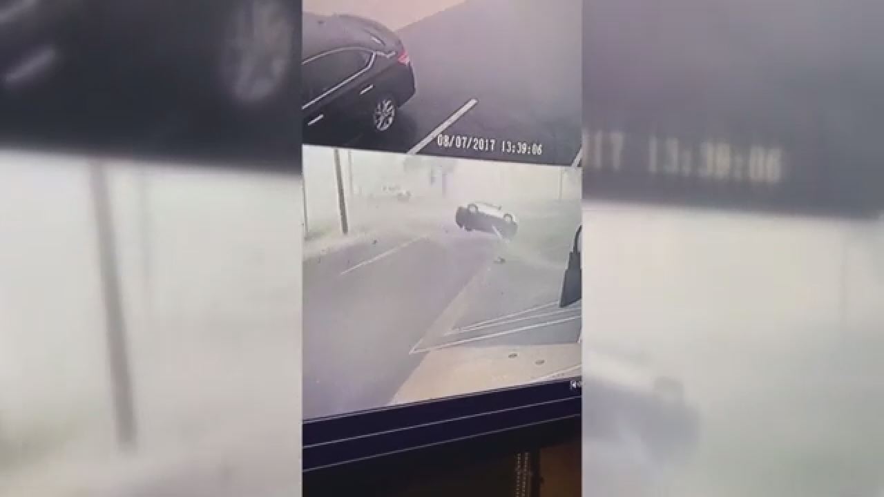 Parked cars flip over during possible tornado in Salisbury