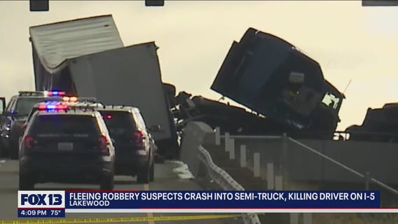Driver killed after fleeing robbery suspects crash into semi-truck