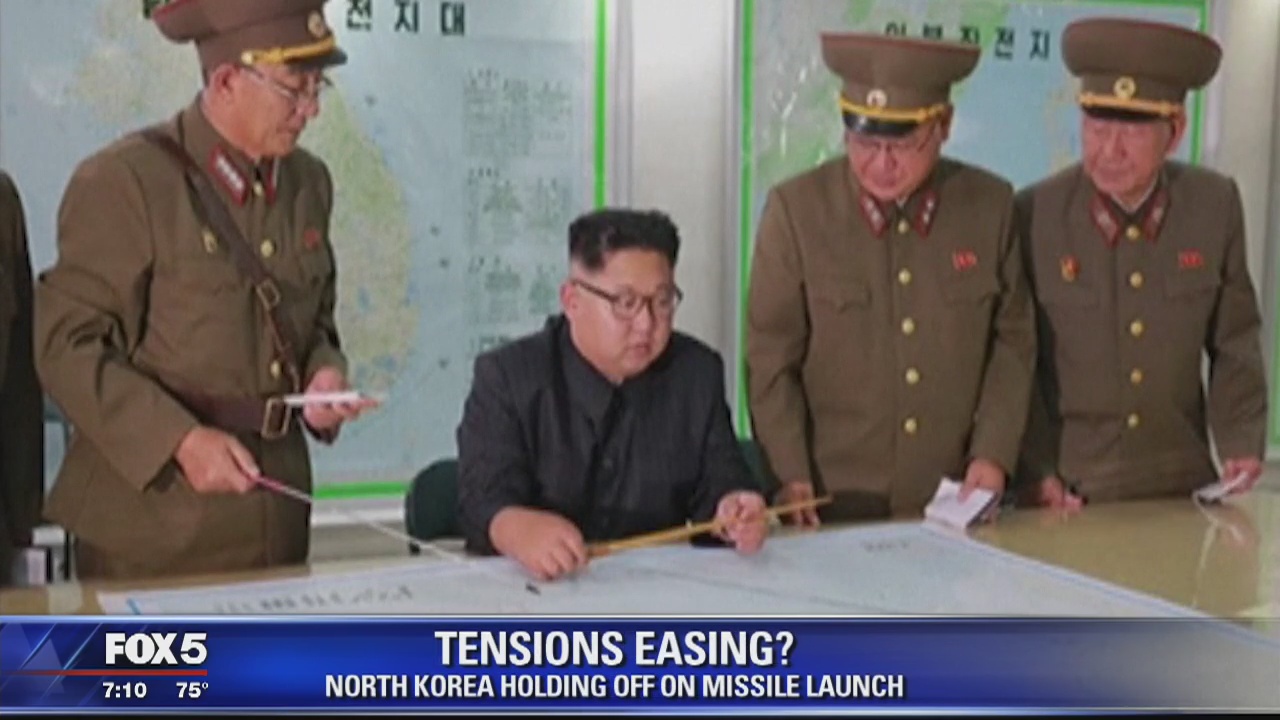 North Korea appears to be holding off on Guam attack