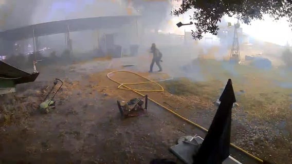 Raw Video: Wildfire storm blows through Chinese Camp ranch