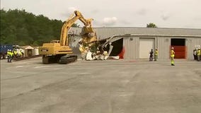 Gov. Hogan demolishes building during Purple Line ground breaking