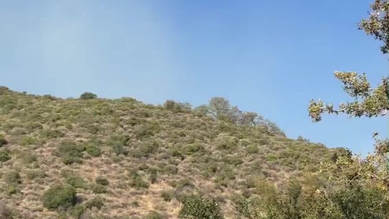 CalFire drops retardant on San Jose brush fire