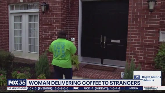 Woman delivering coffee to strangers.