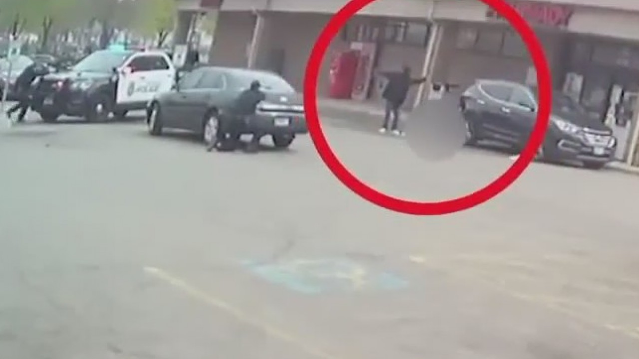Body camera video shows officers shooting man accused of killing ex-girlfriend outside Walgreens