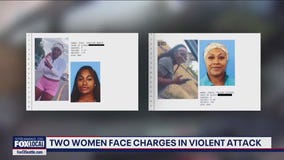 Two women face charges in violent attack