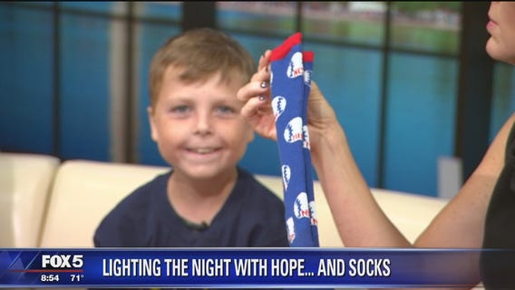 Hope, socks help Michael Erlandson as he battles cancer