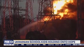 Ukrainian school kids holding onto hope