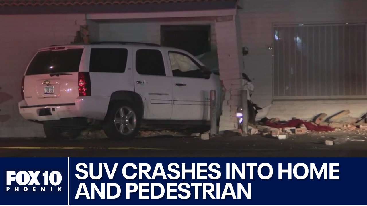 SUV crashes into a building at Indian School Road