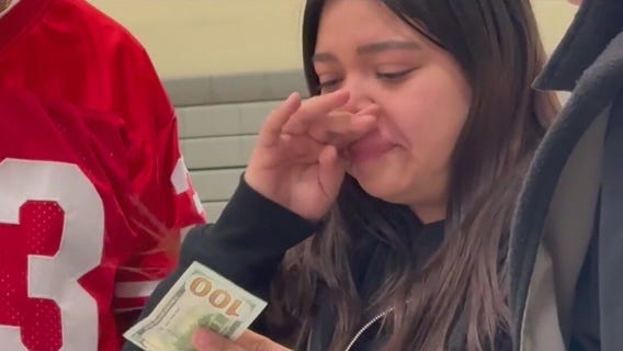 Secret Santa spreads holiday cheer with $100 bills