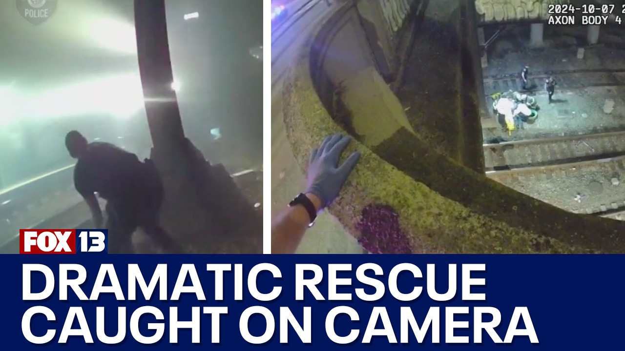 WA police rescue man from train tracks in the nick of time