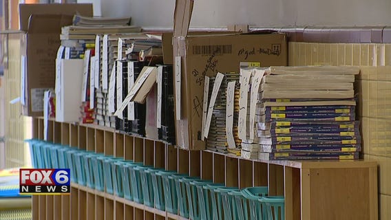 St. Joseph Academy donates textbooks to Rotary Club