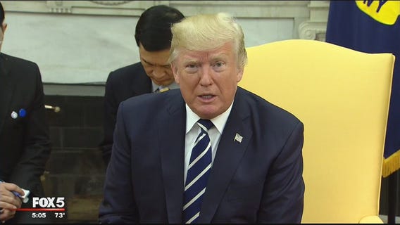 Trump sticks to somber script, refuses to join guns debate