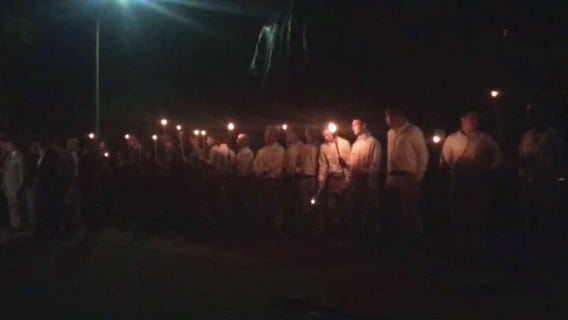 White nationalists march again with torches in Charlottesville